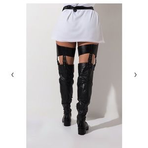 Thigh high boots with belt
